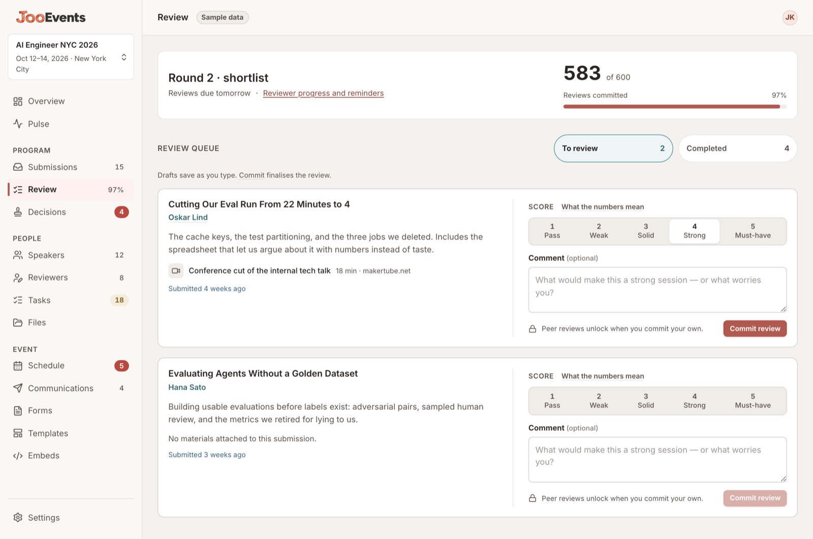 The review screen: reviewer roster with completion counts, and a scoring queue.